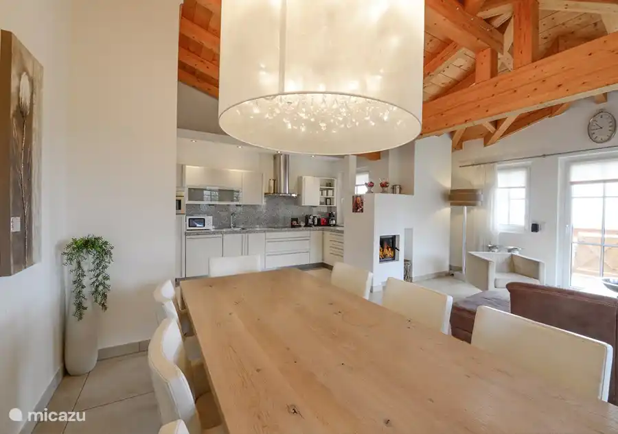 Beautiful kitchen with large dining table.