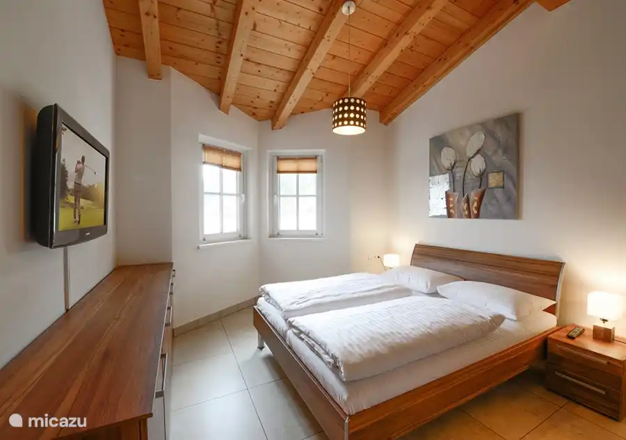 There are three luxurious bedrooms, one of which has a bunk bed.