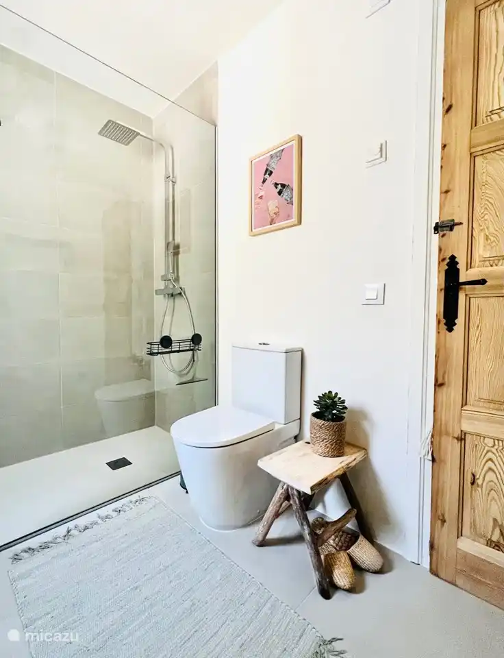 Both bathrooms have a walk-in shower, sink, toilet, large mirror, soft towels and ample storage space