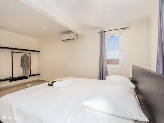 DEUX villas avec vue sur l'océan piscine privée | Curaçao, Banda Abou (ouest), Tera Korá - villa Chambre principale avec lit king size - Villa Kenepa