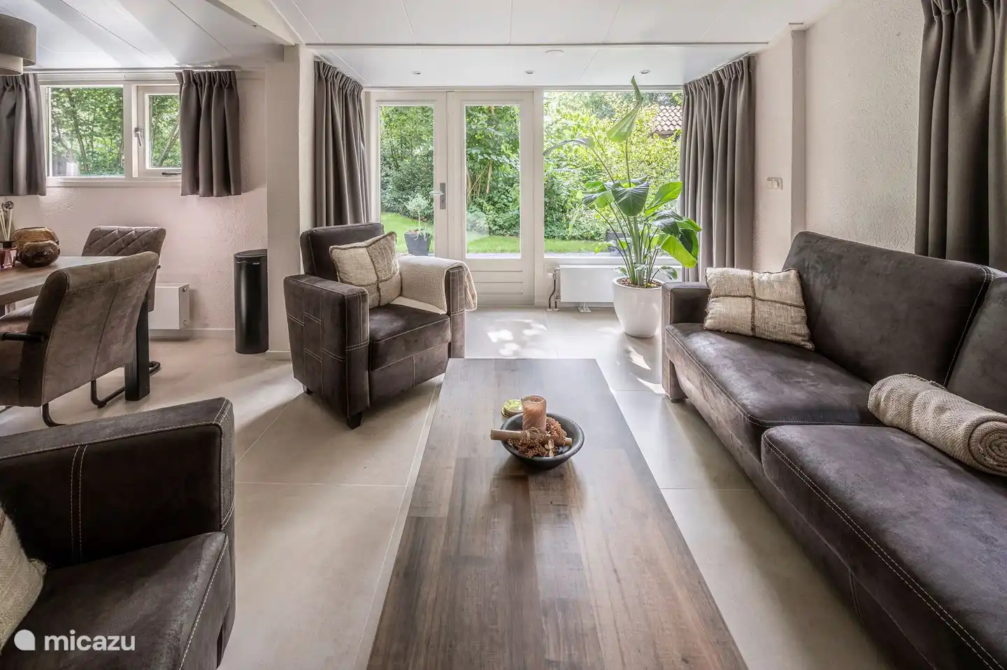 Nice view of the garden you can sit on the sunny terrace from the living room through the patio doors.