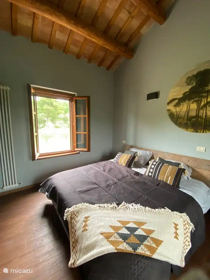 Bedroom with three beds