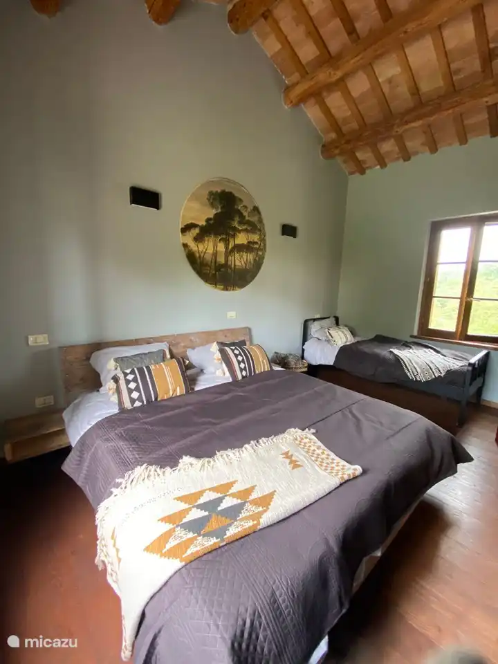 Bedroom above three beds