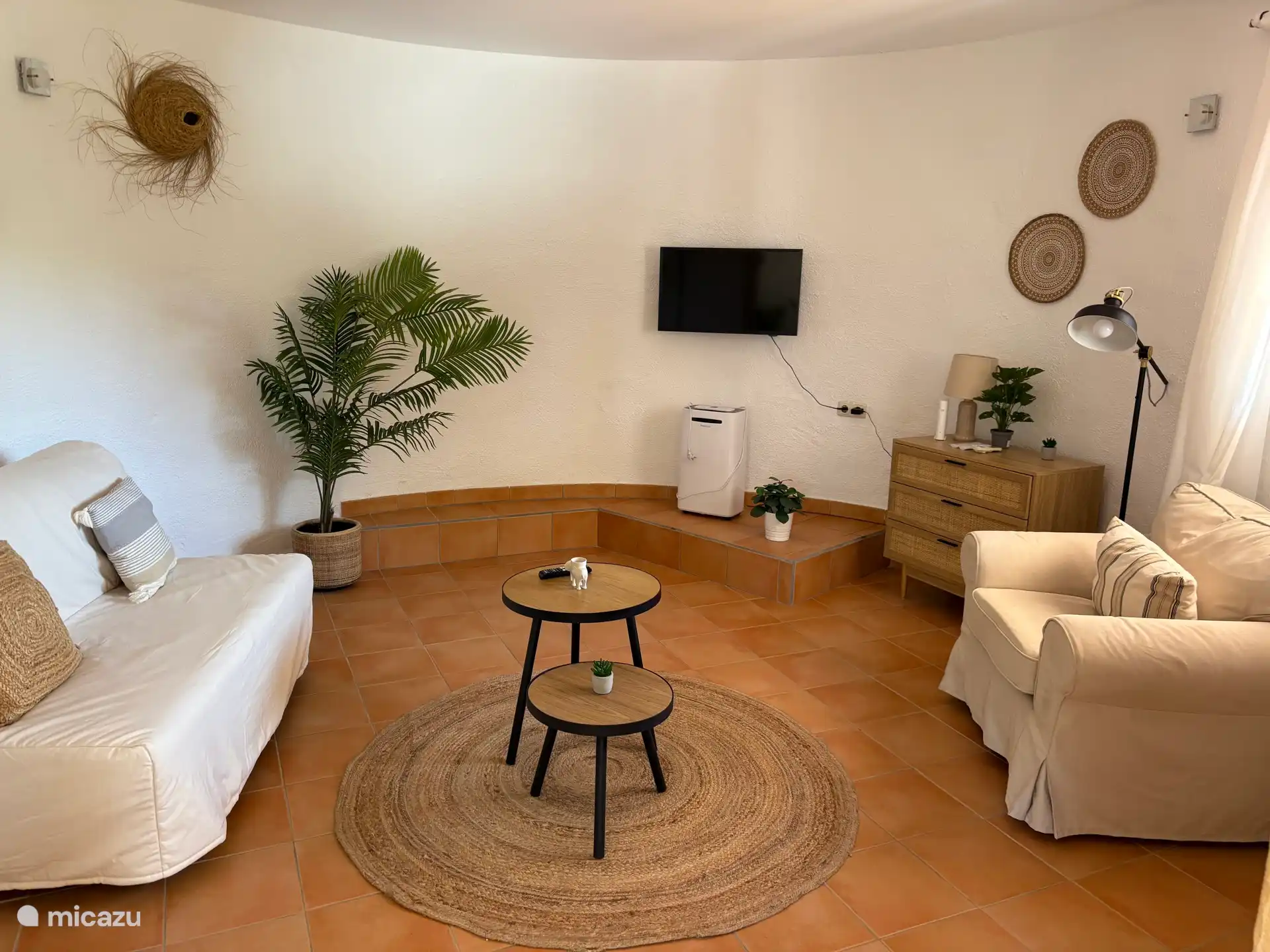 Sala de estar con sofá cama
