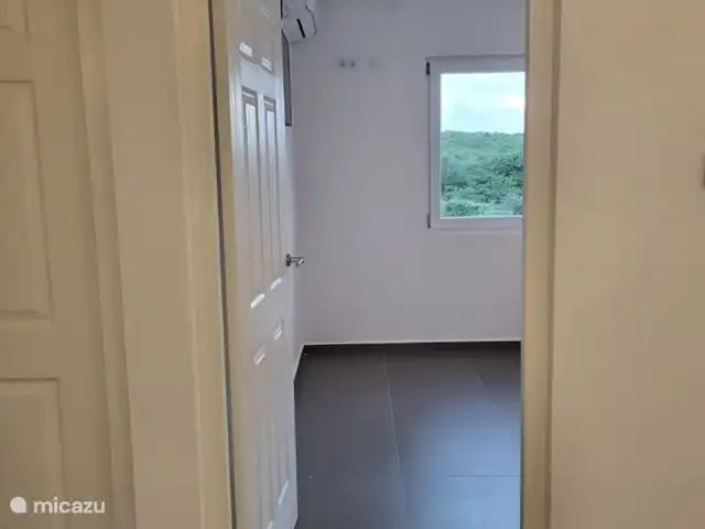 Chong’s Villa huren in Curaçao, Banda Abou (west), Grote Berg - villa Ingang van laundry room