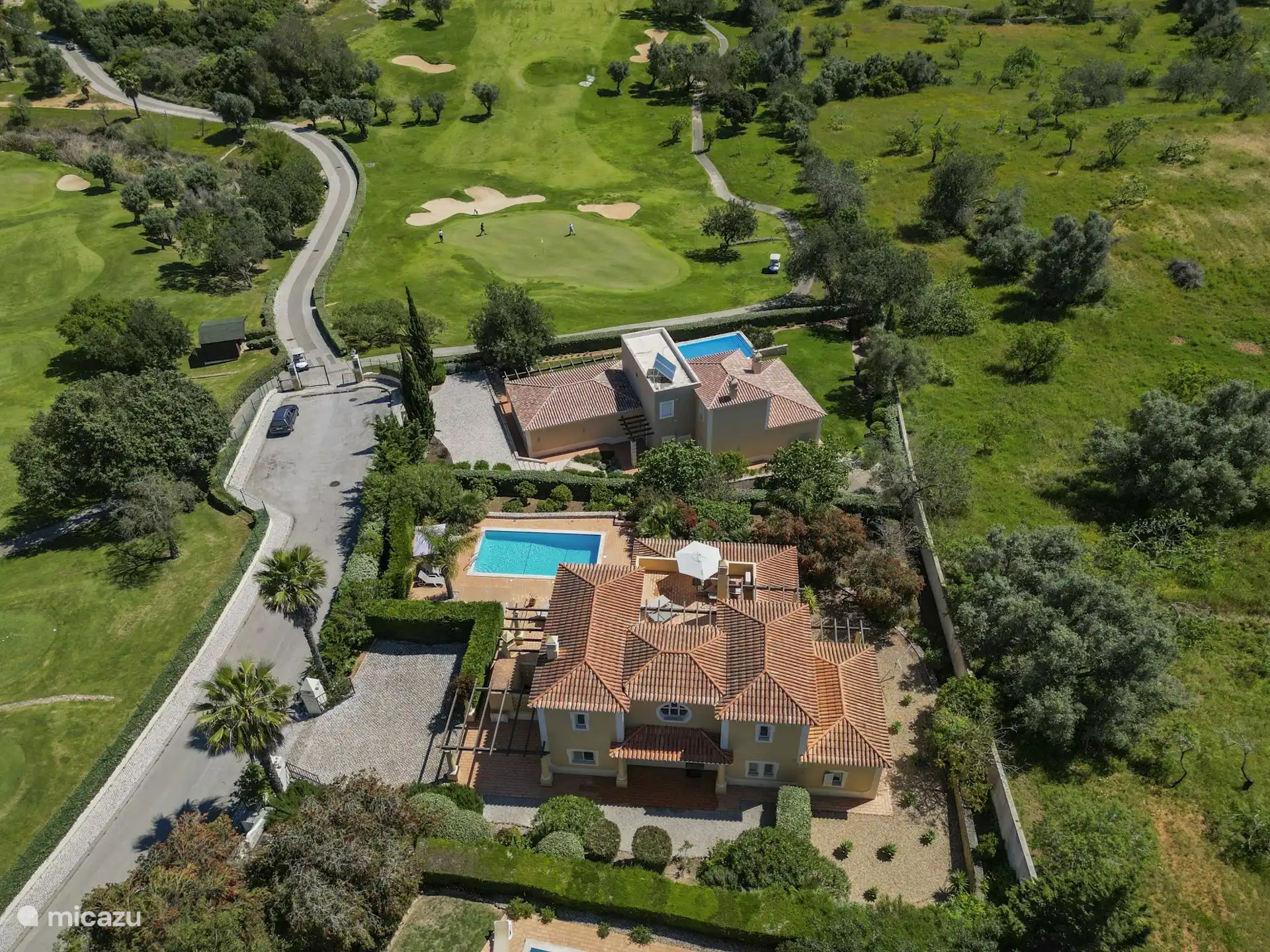Villa, pool and golf courses