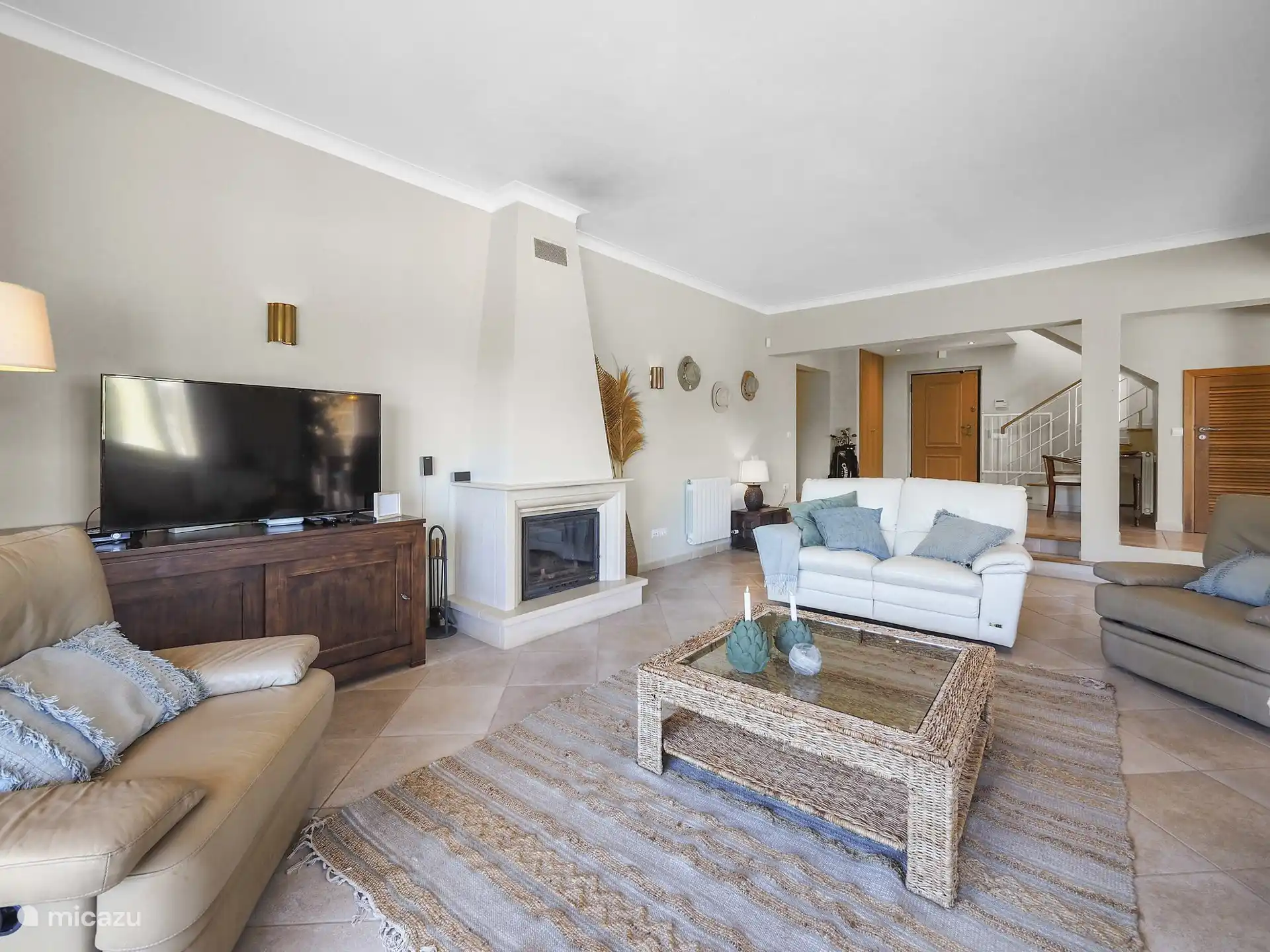 spacious living room with fireplace