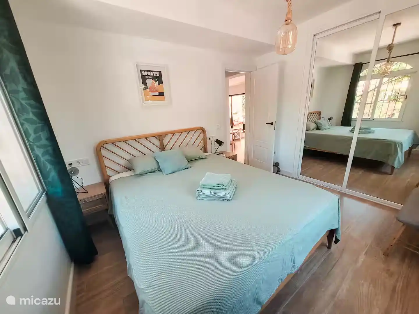 Bedroom 1 with 160x200cm bed, fan and air-conditioning.