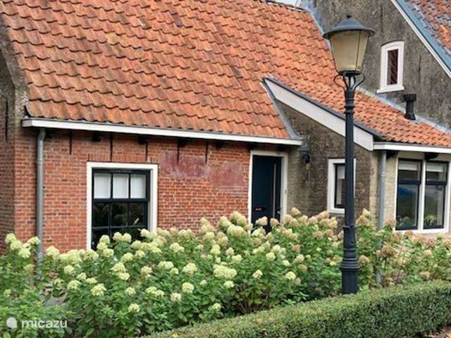 Holiday home in Netherlands, Friesland – holiday house House on the mound