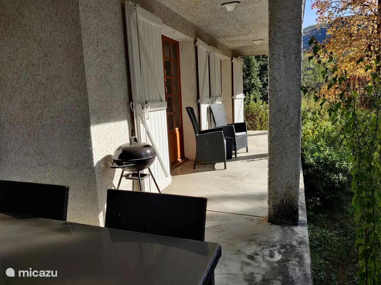 Your own covered terrace to enjoy a drink or meal with the beautiful view of the mountains