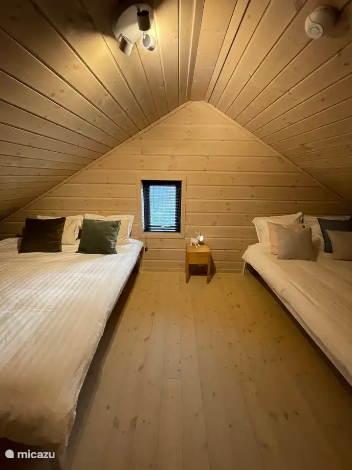 Troisième chambre au premier étage avec 2 lits doubles 