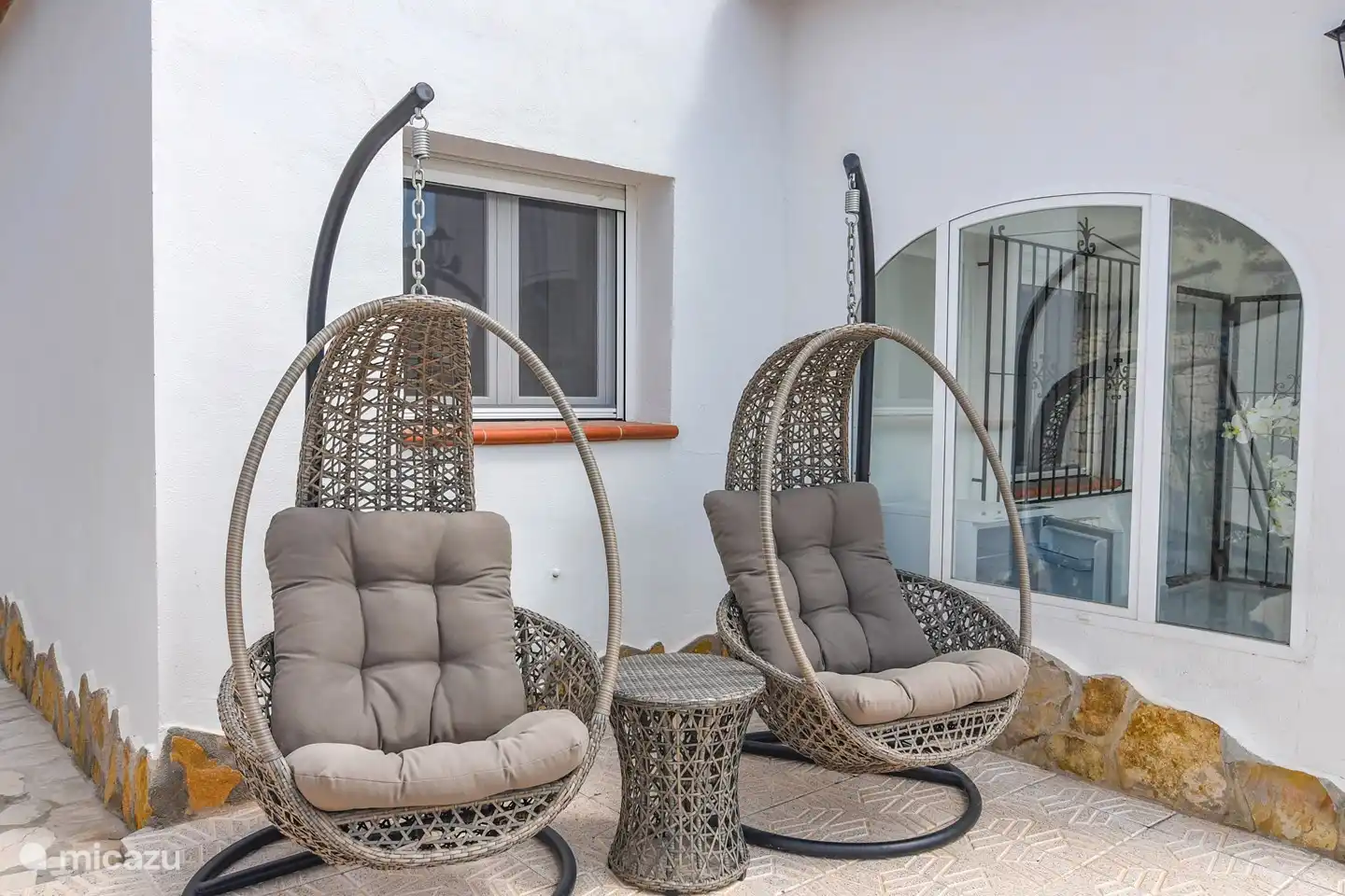 Two hammock chairs to relax, and very popular with the children.