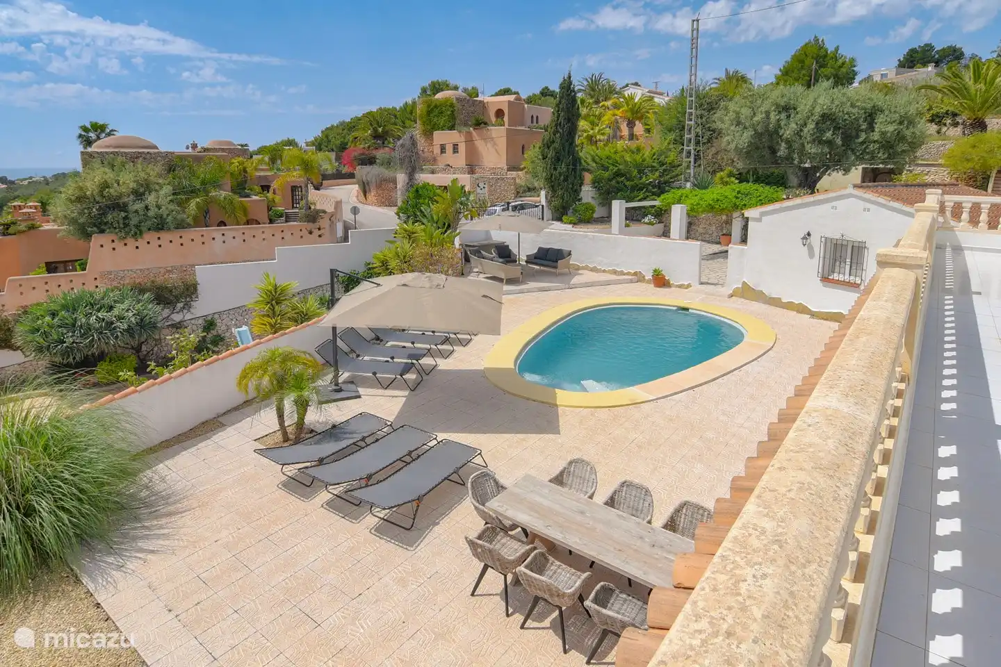 Lovely sunny terrace with unobstructed views over Moraira and the sea.