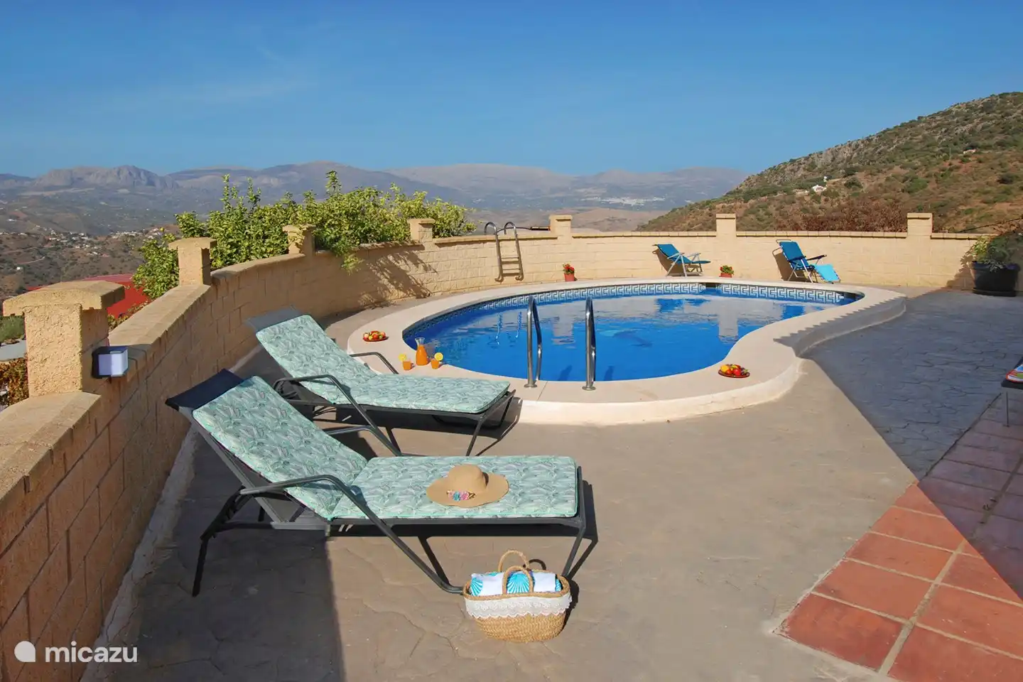 A dip before dinner? In the distance you can see the Sierra Tejeda.