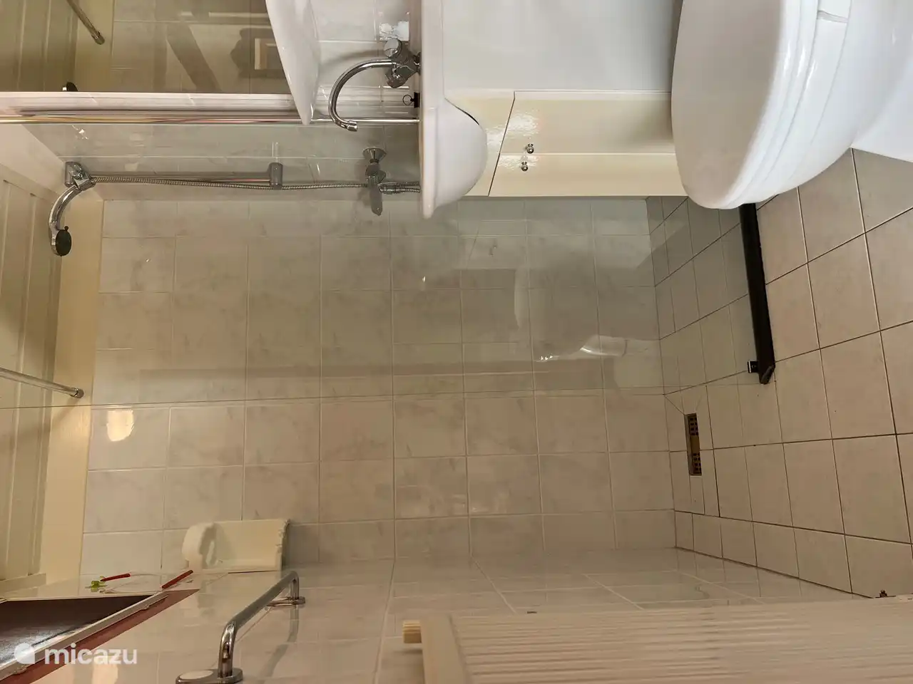 Bathroom with shower and toilet.