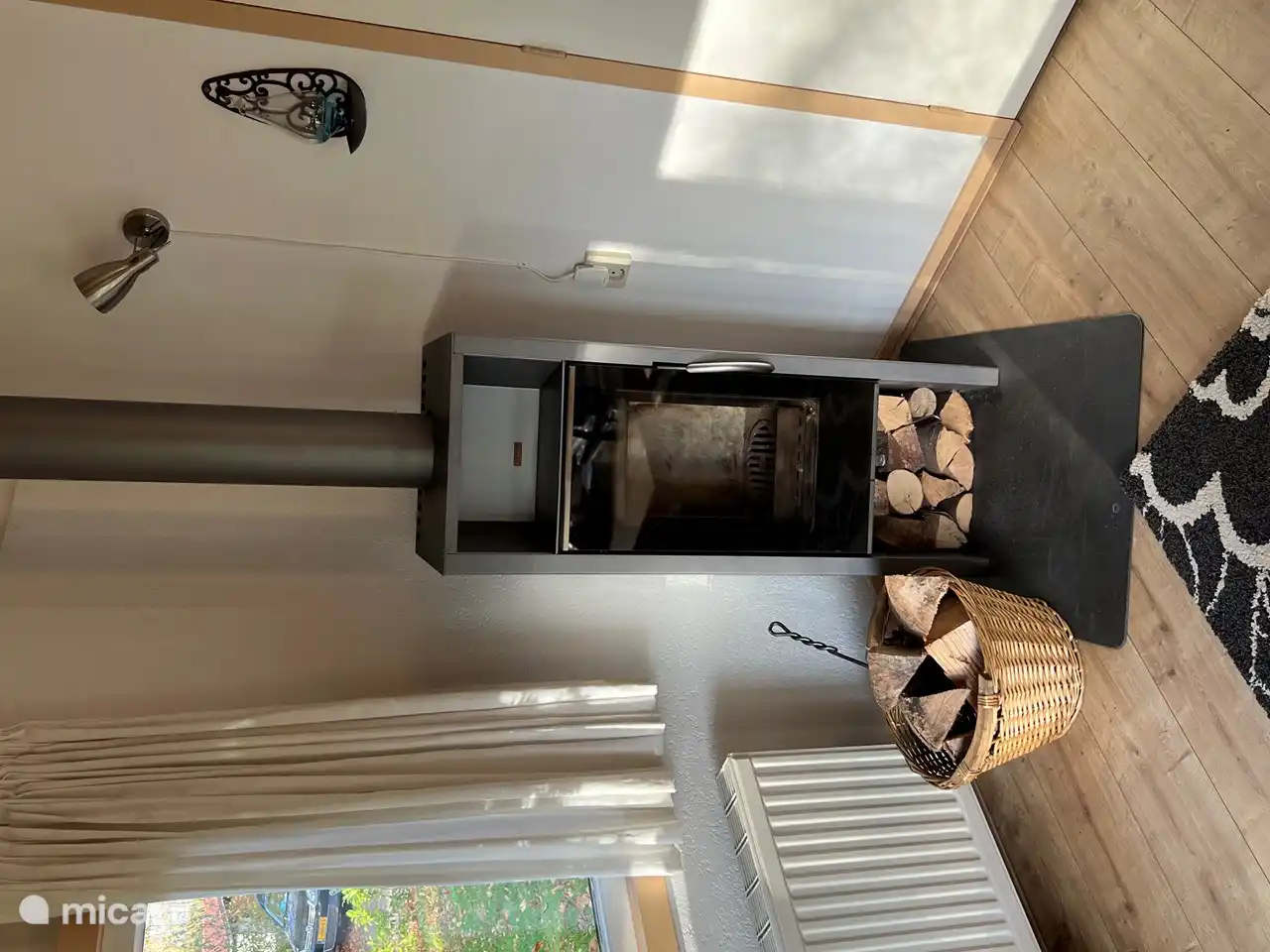 In cold weather you can use this wood stove to create a cozy atmosphere at home. You can use the firewood that is located at the garden shed. The bungalow has central heating.