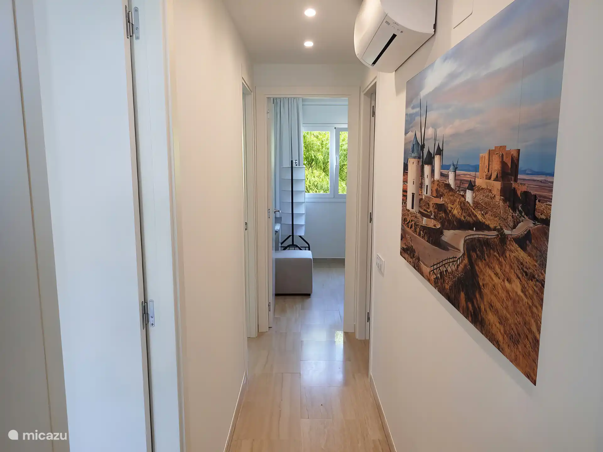 Hallway with the 3 bedrooms and 2 bathrooms