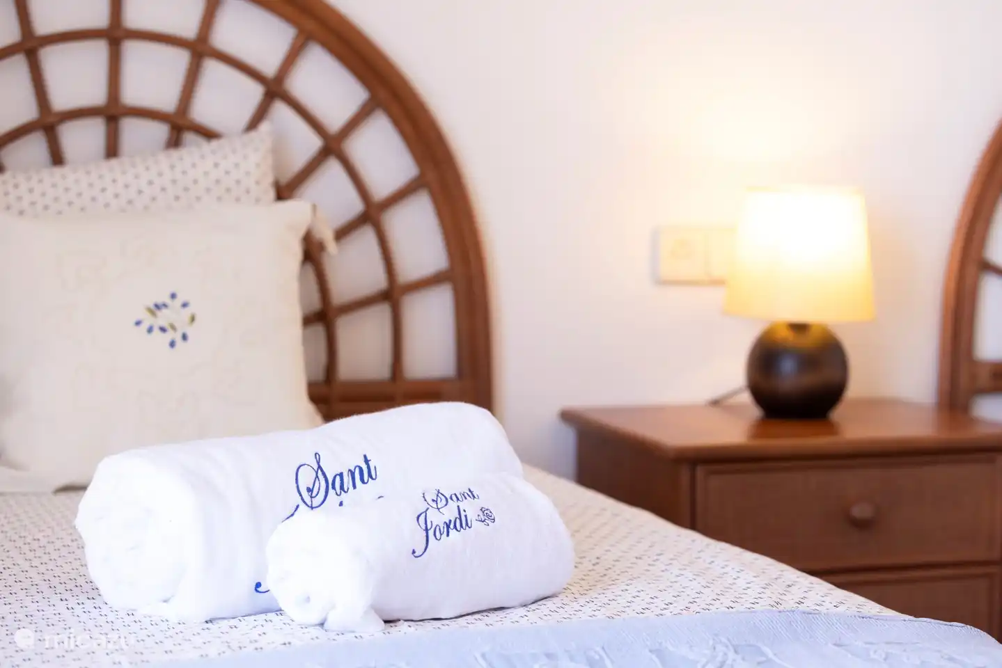 Twin bedroom with patio doors to a balcony with stunning views