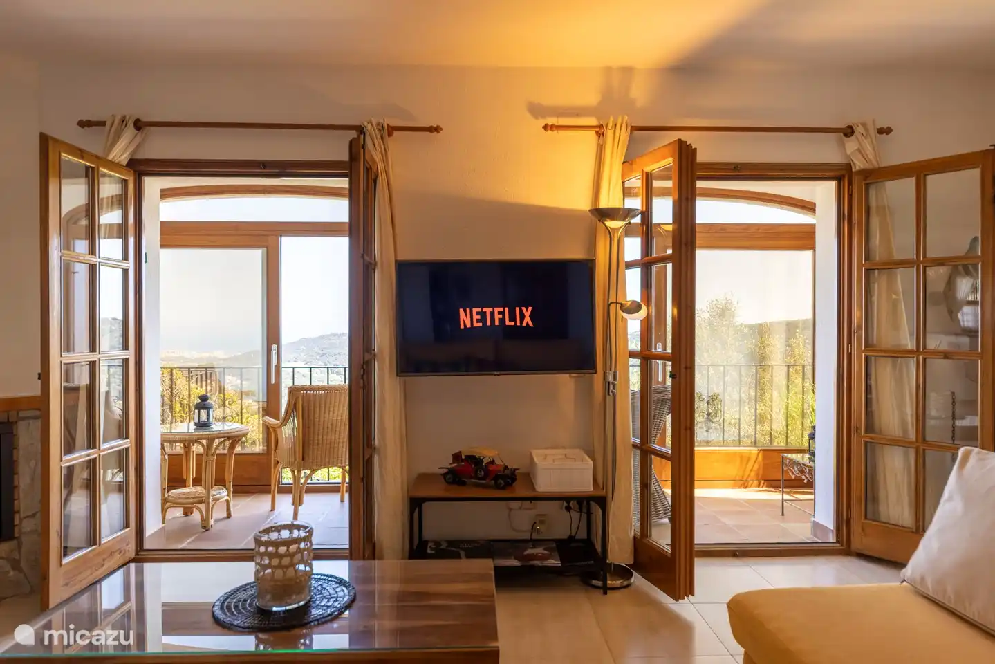 living room with patio doors to balcony