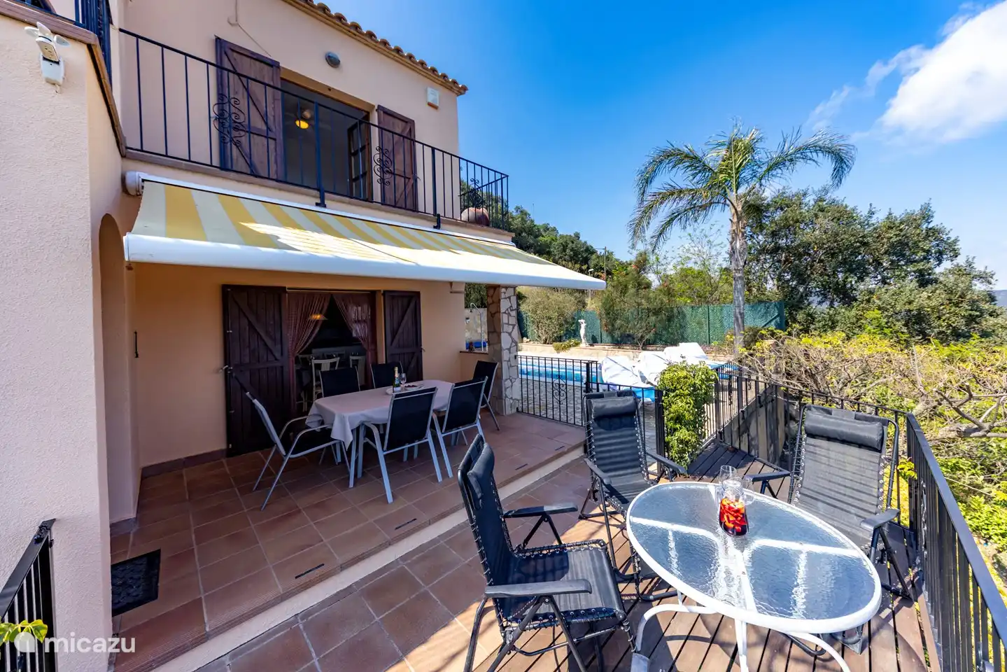 terrace with access to swimming pool
