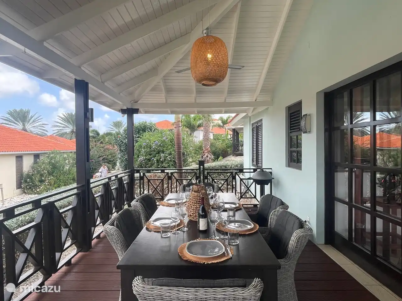 The Blue Bay Beachvilla - Veranda sfeervol dineren