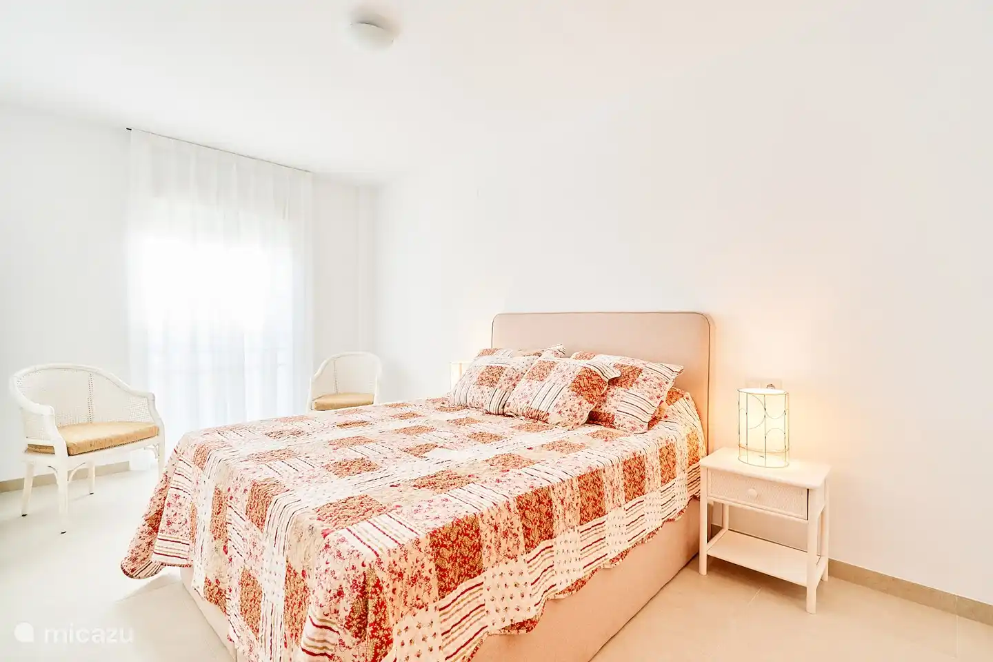 master bedroom with double bed and private bathroom