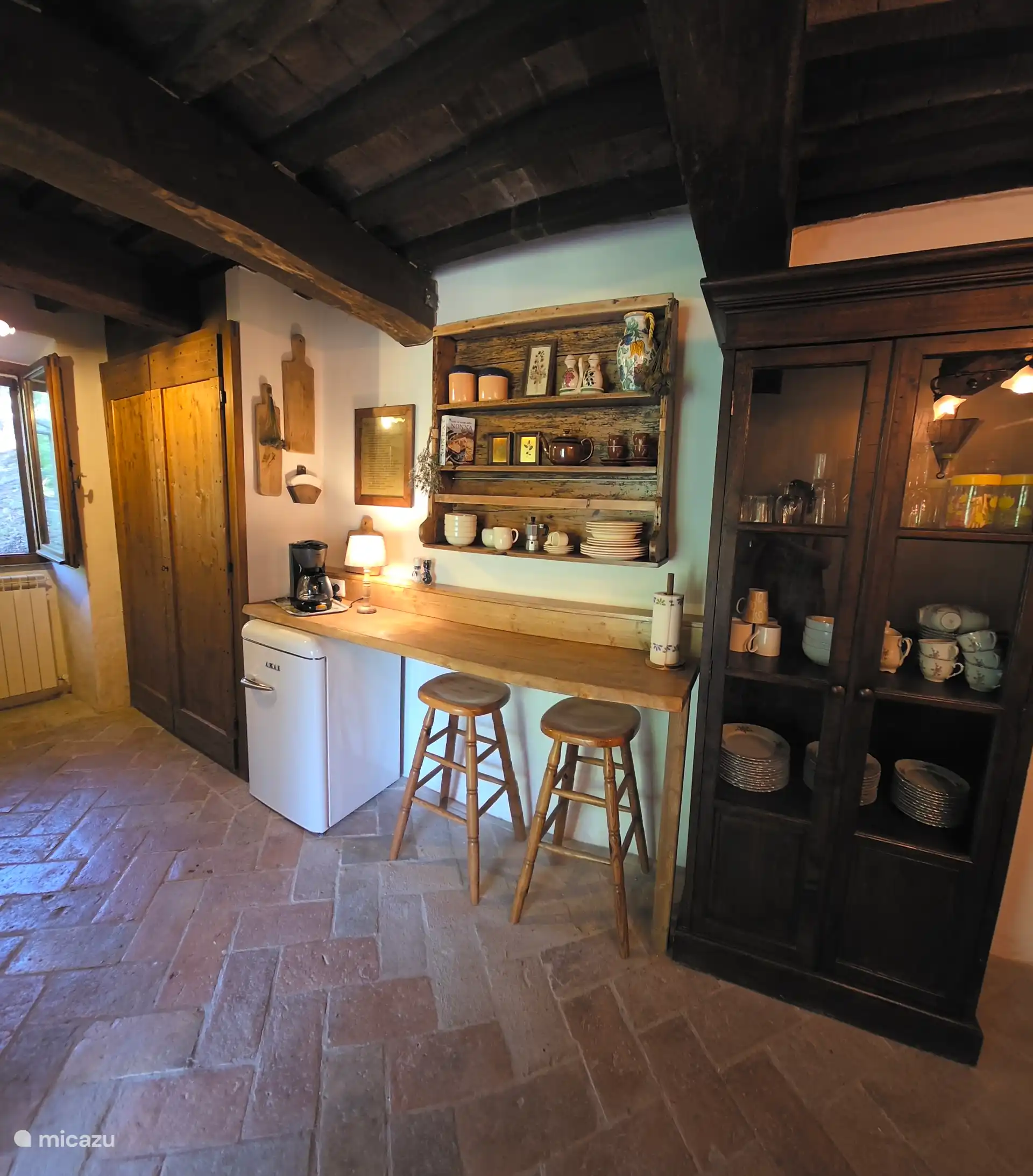 Cozy coffee corner in the kitchen of the guesthouse