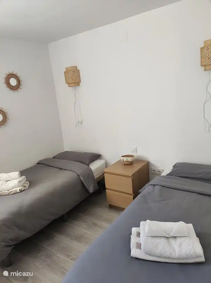 dormitorio 1 con 2 camas individuales