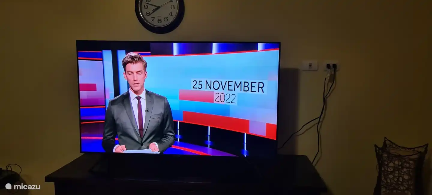 There is a 55 inch TV screen with Dutch, Belgian and German channels. Also all sports channels and video channels including the American channels