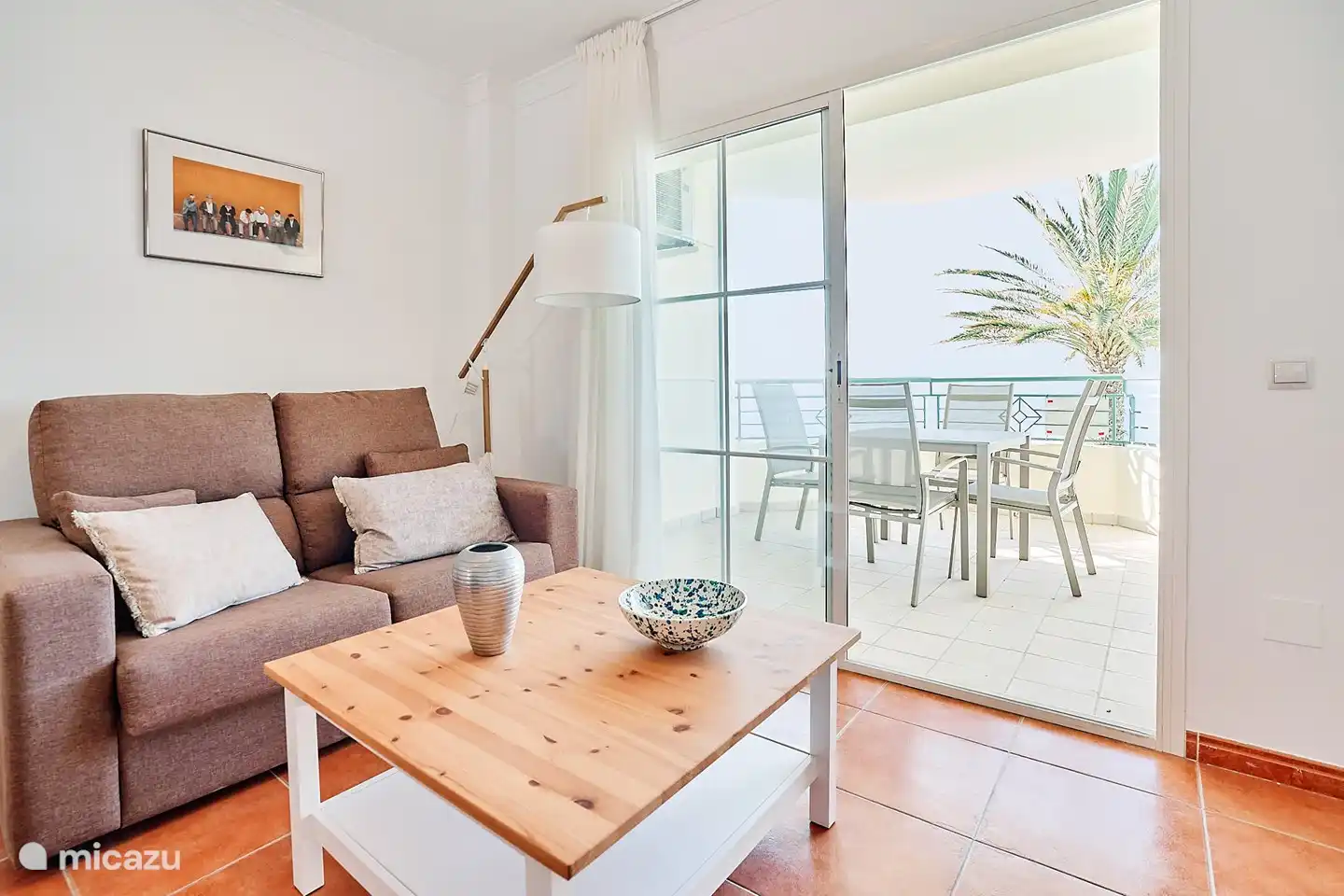 Wohnzimmer mit Zugang zur Terrasse