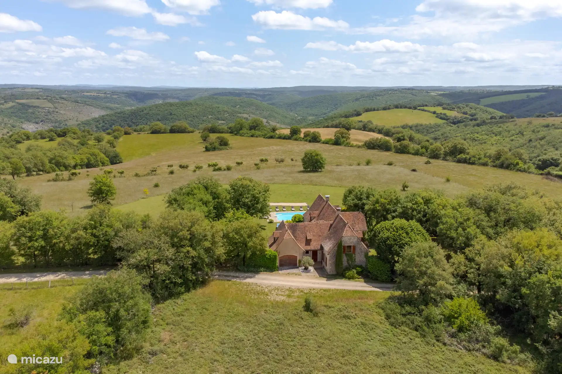 The house in the middle of the greenery