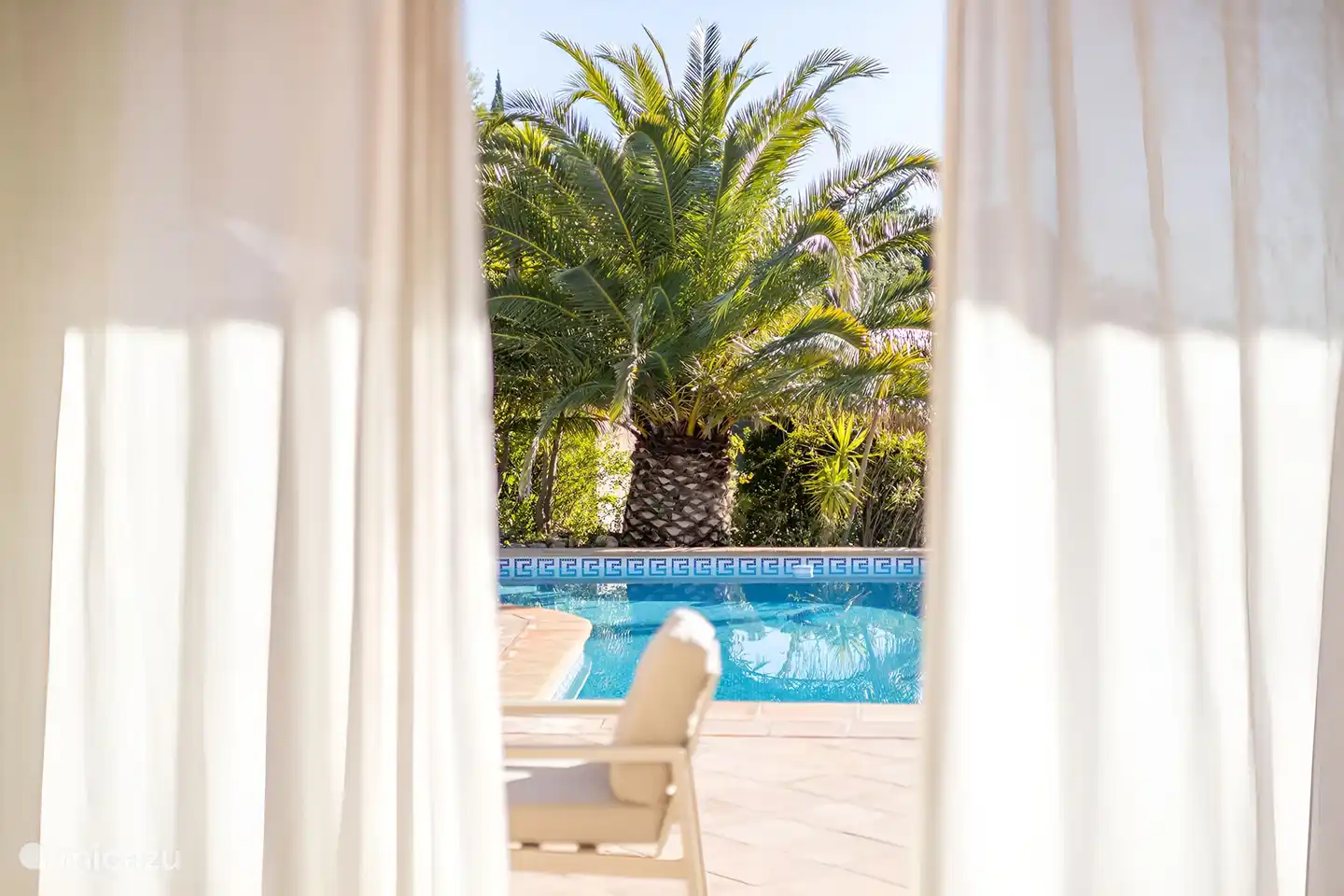 View from the living room of the swimming pool, sea and Saint Tropez