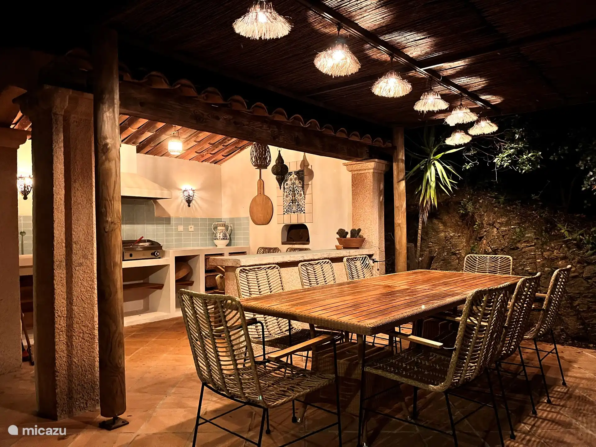 Outdoor kitchen with pizza oven and grill