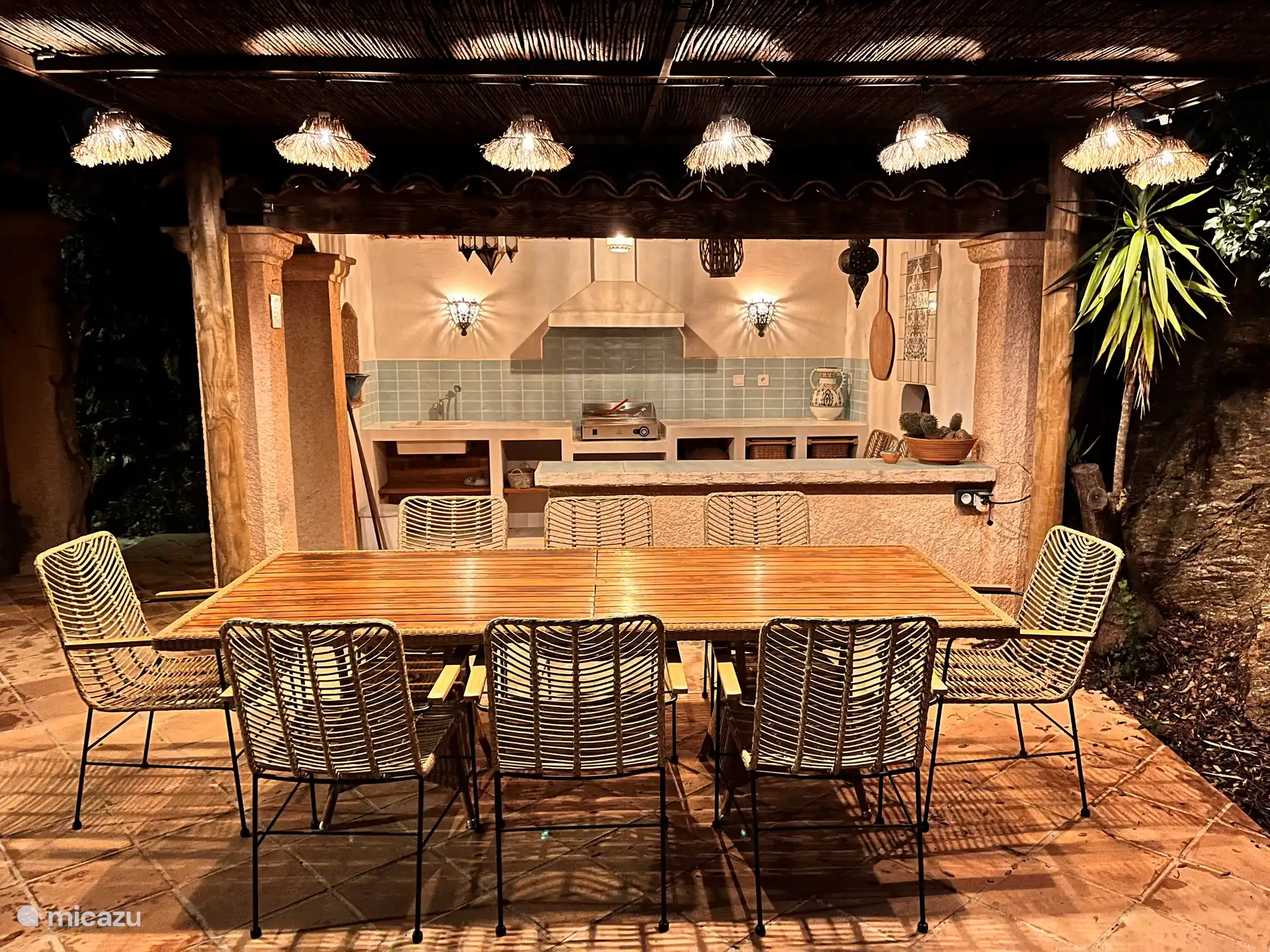 Outdoor kitchen with pizza oven and grill