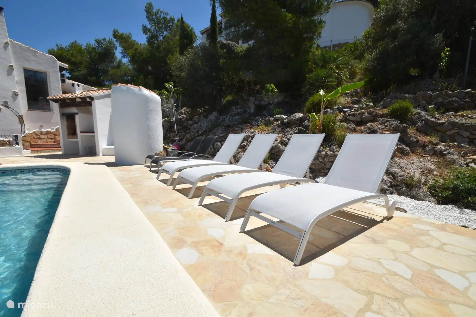 The BBQ and outdoor shower are also available. Enjoy the peace and quiet and the Spanish greenery