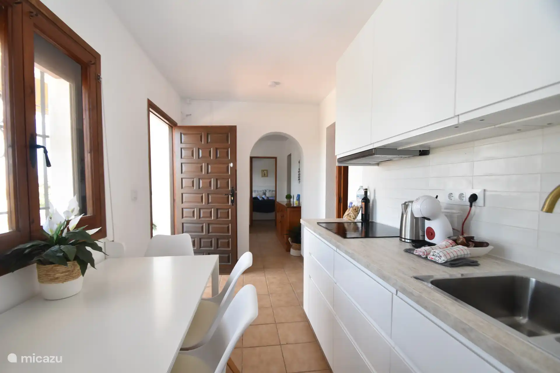New kitchen with all modern appliances and washing machine