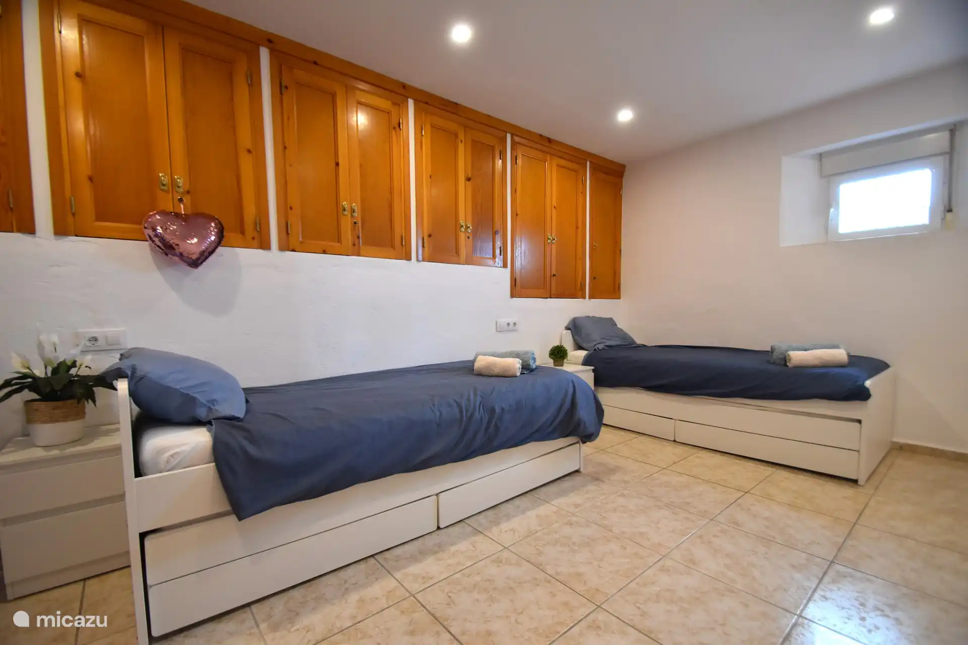 room with 2 separate beds (pull-out if necessary)