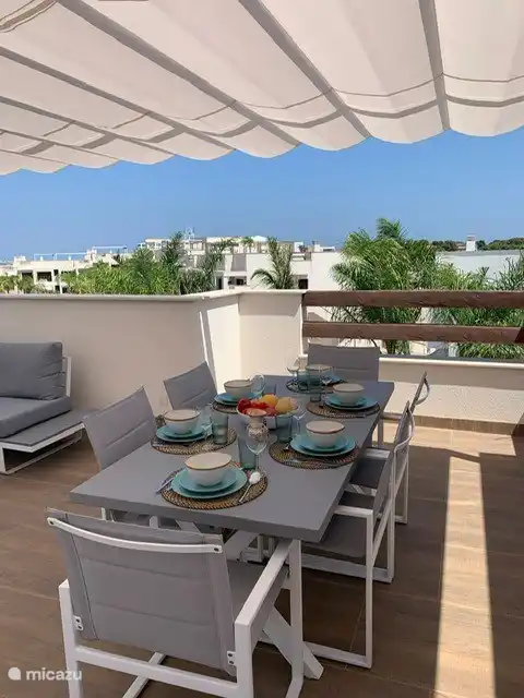 Sun terrace with awning