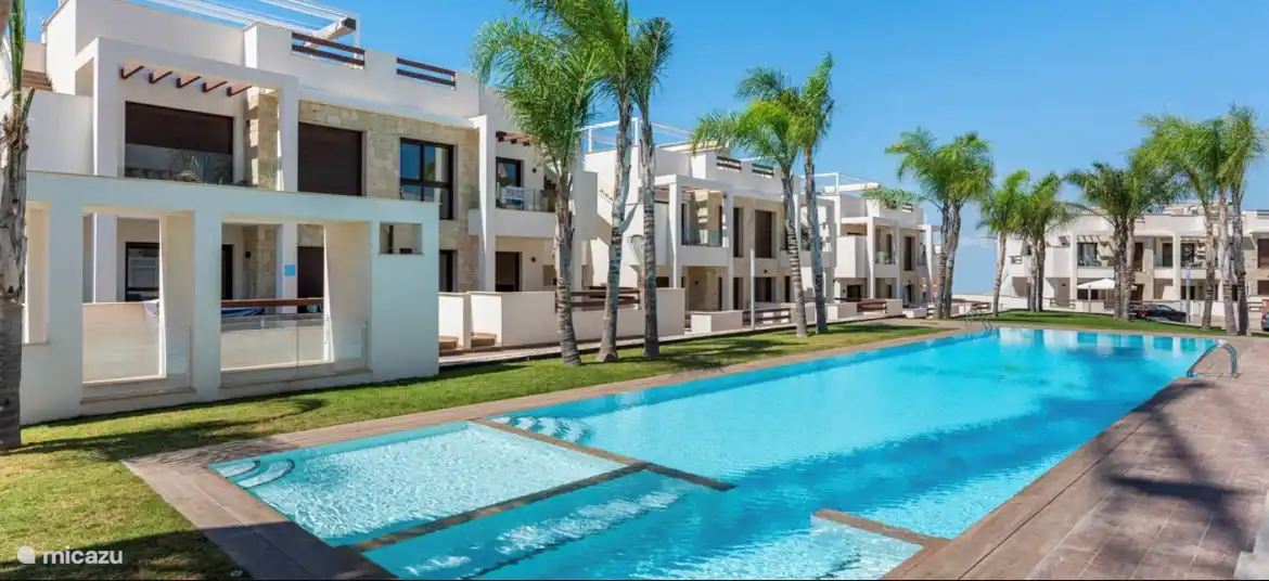 outdoor pool with children's pool and jacuzzi
