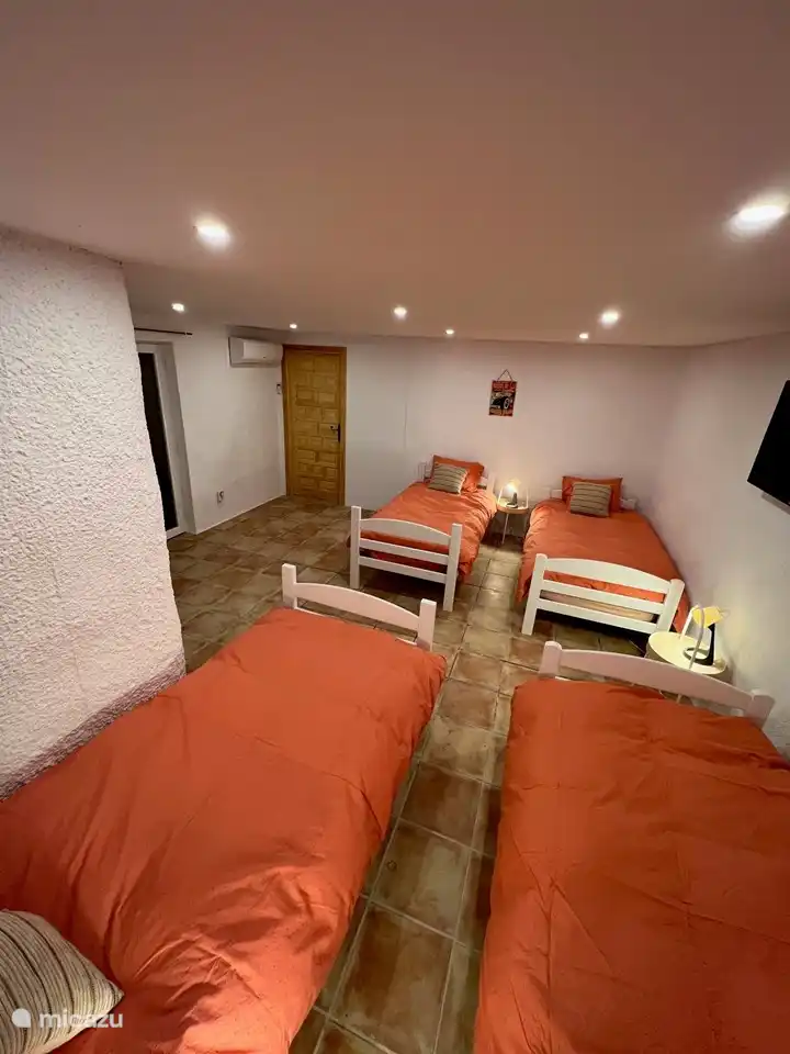 Bedroom 4 on the lower floor with ensuite bathroom.