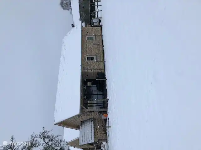 Winter makes it even cozier. A delicious hot chocolate by the wood stove. 