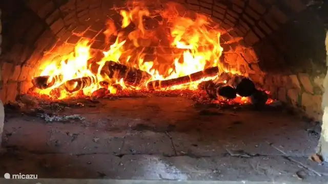 The oven is fired up and we make some delicious stone oven pizzas.