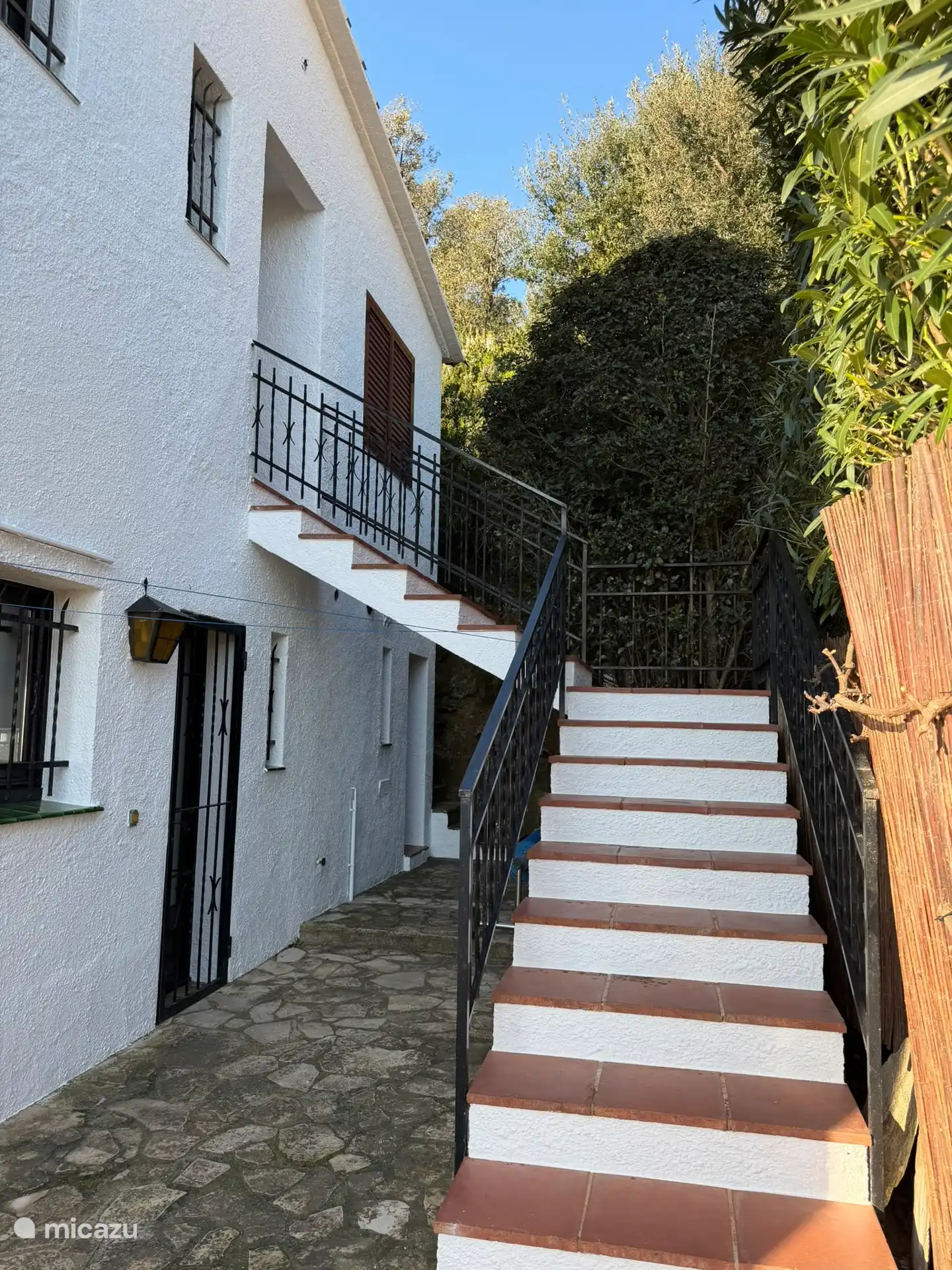 Opgang naar het verblijf met 2 slaapkamers en 2 badkamers