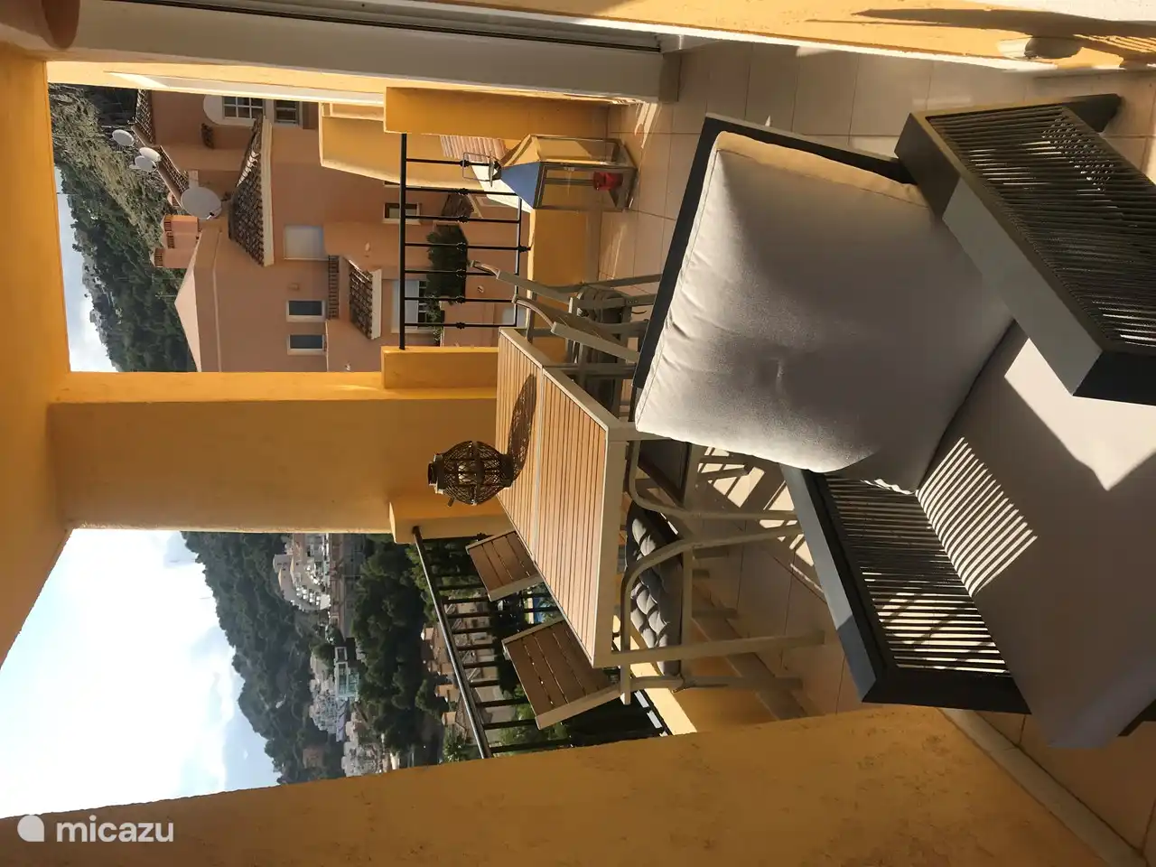 See here the dining area with four chairs on your terrace.