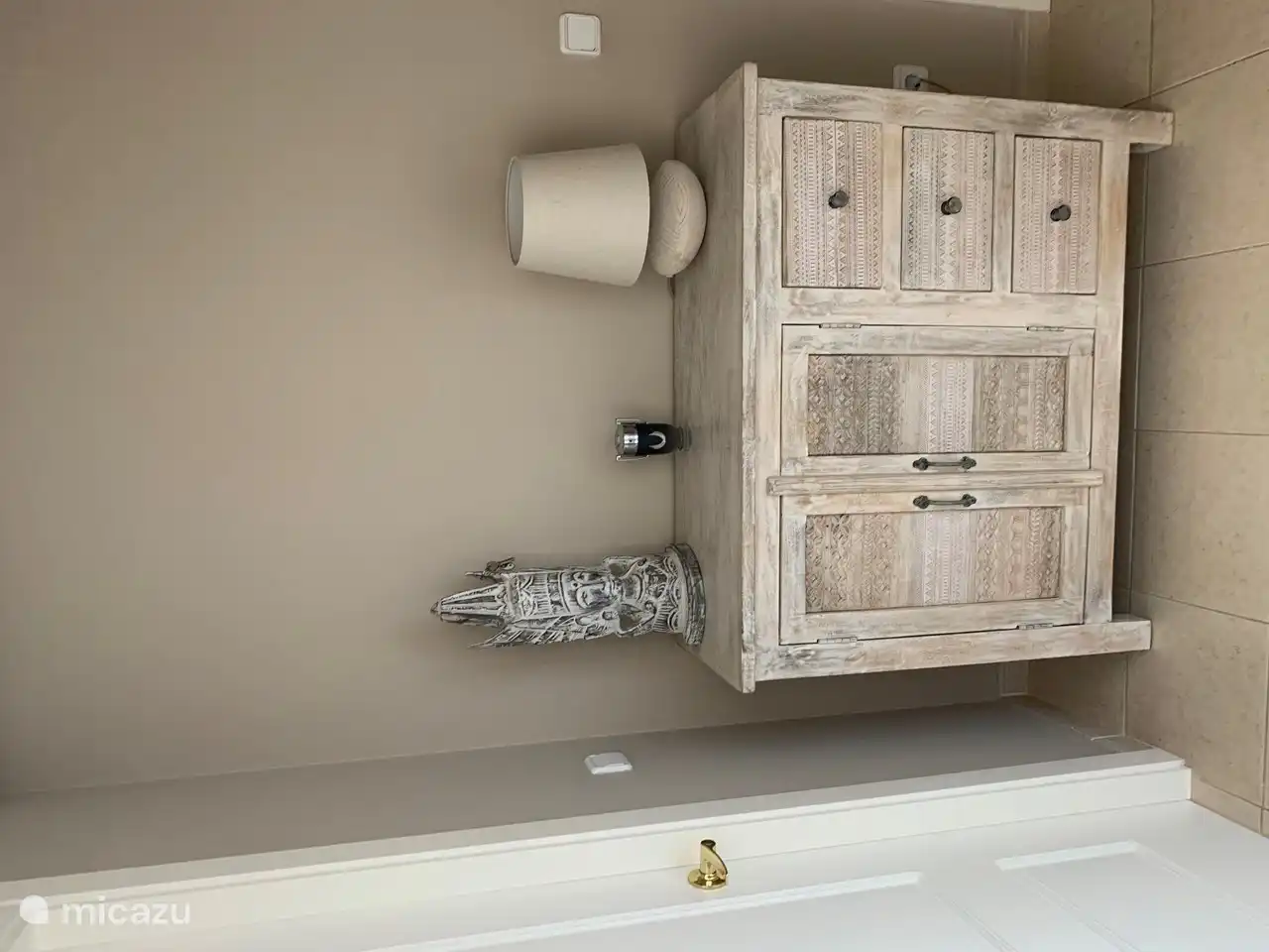 Hall with cupboard for storage space.