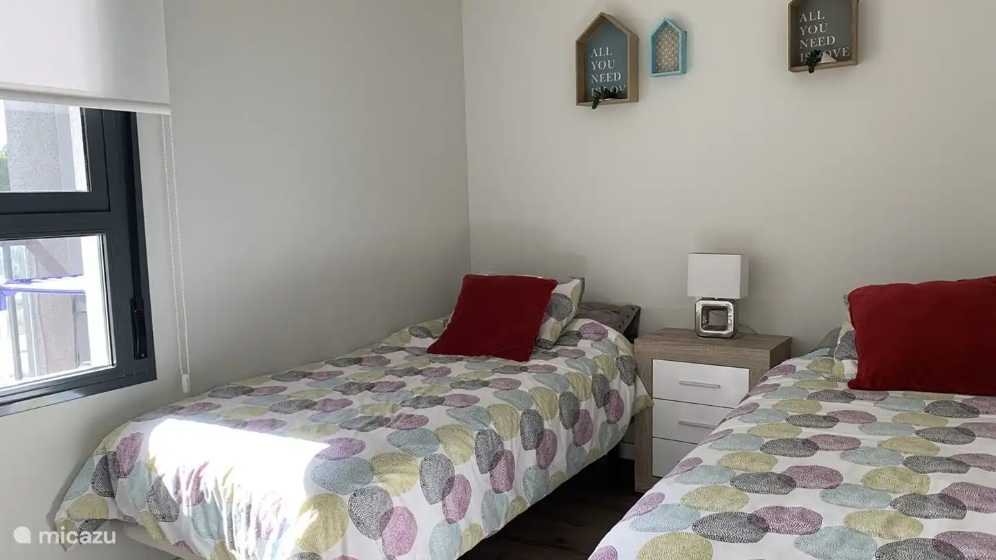 Schlafzimmer mit 2 Betten