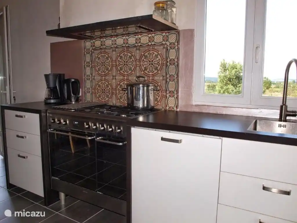 Cuisinière à gaz avec 2 fours.