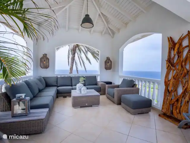 Villa Sol en Curazao, Bandabou (oeste), Coral Estate, Rif St.Marie - villa El mirador en la terraza exterior con vista al Mar Caribe.