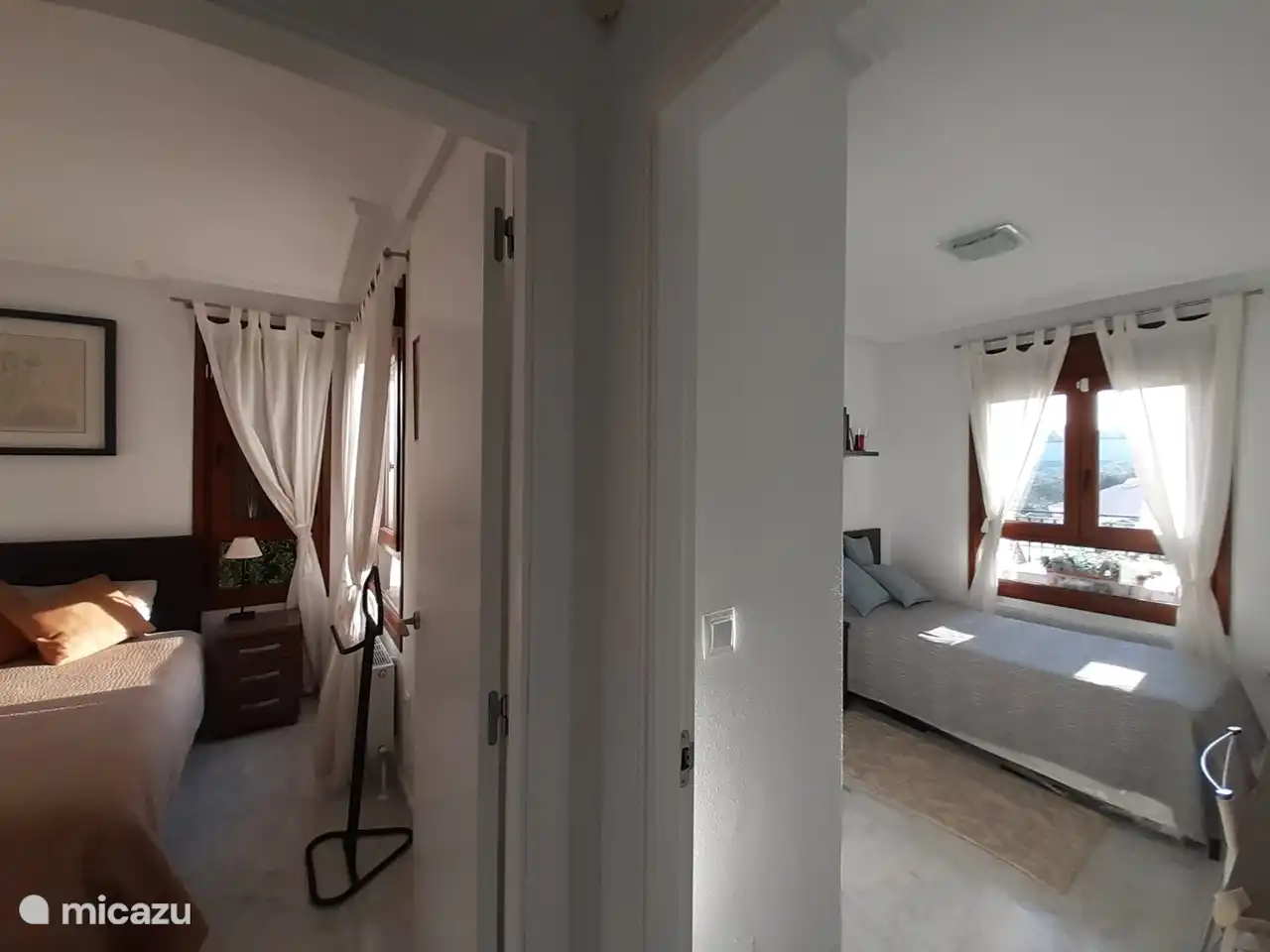 De twee slaapkamers beneden met
Plafondventilator. Zeer goed bij het slapen. 