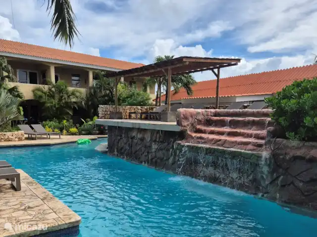 Cocobana18 huren in Curaçao, Banda Ariba (oost), Cas Grandi - appartement Ook de waterval gaat in bepaalde uren aan voor een mooie sfeer.